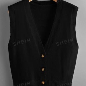 Black sweater vest